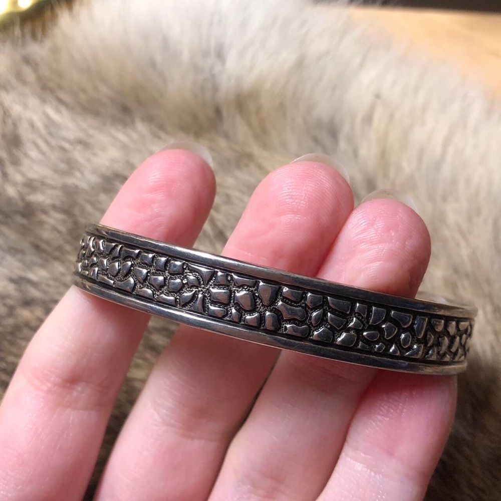 Silver toned pebble cuff bracelet